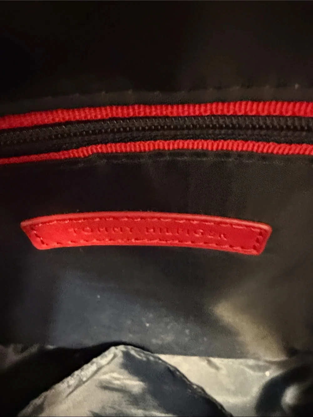 Tommy Hilfiger Red and White Monogram Backpack with Tan Trim.